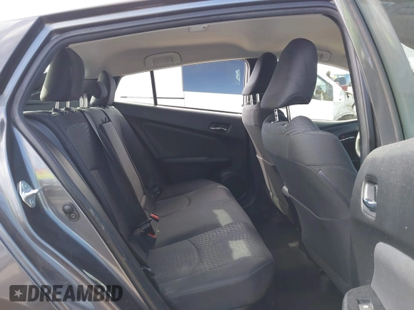 2016 Toyota Prius Four z VIN JTDKARFU2G3022031, wystawiony jako IAAI lot #41631802 z przebiegiem 151 389 mil mil oraz . Historia ofert i sprzedaży dostępna na DreamBid. Obrazek 8.