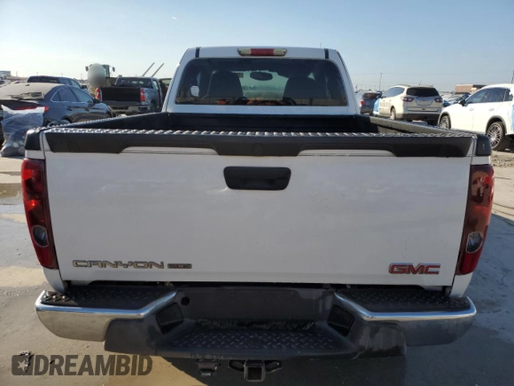 2004 GMC Canyon SLE Z71 with VIN 1GTDS196648166961, listed as a Copart auction lot 76952294 with 189,796 mi miles and Salvage Title. Bid and sale history available at carsss.com. Image 6.