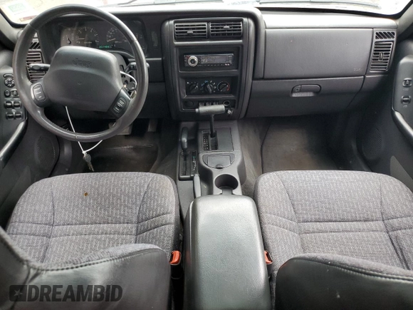 2000 Jeep Cherokee with VIN 1J4FF48SXYL198290, listed as a Copart auction lot 66026705 with 201,409 mi miles and Clean title. Bid and sale history available at DreamBid. Image 8.