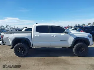 2019 Toyota Tacoma 4WD SR with VIN 3TMCZ5AN3KM277204, listed as a IAAI auction lot 41278640 with 78,930 mi miles. Bid and sale history available at carsss.com. Image 13.