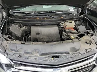 2020 Chevrolet Traverse LT Cloth with VIN 1GNEVGKW5LJ136101, listed as a IAAI auction lot 42088231 with 80,812 mi miles. Bid and sale history available at carsss.com. Image 1.