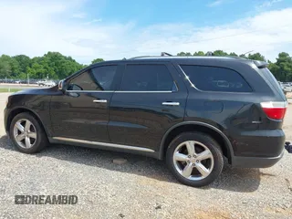 2013 Dodge Durango Citadel z VIN 1C4RDHEG7DC562546, wystawiony jako IAAI lot #42311942 z przebiegiem 286 411 mil mil oraz . Historia ofert i sprzedaży dostępna na DreamBid. Obrazek 14.