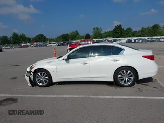 2014 Infiniti Q50 Sport with VIN JN1BV7AR4EM698230, listed as a IAAI auction lot 42664588 with 129,411 mi miles and . Bid and sale history available at DreamBid. Image 14.