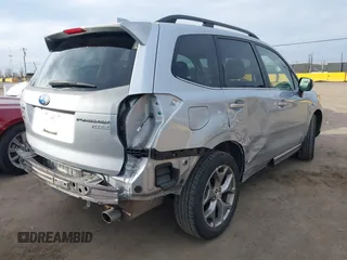 2016 Subaru Forester 2.5i Touring with VIN JF2SJAXCXGH522837, listed as a IAAI auction lot 41562541 with 106,720 mi miles. Bid and sale history available at carsss.com. Image 4.