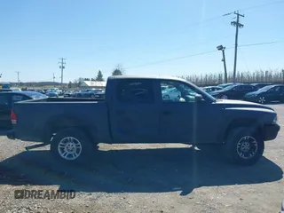 2004 Dodge Dakota Sport with VIN 1D7HG38K84S608161, listed as a IAAI auction lot 41863394 with 145,288 mi miles and . Bid and sale history available at DreamBid. Image 13.