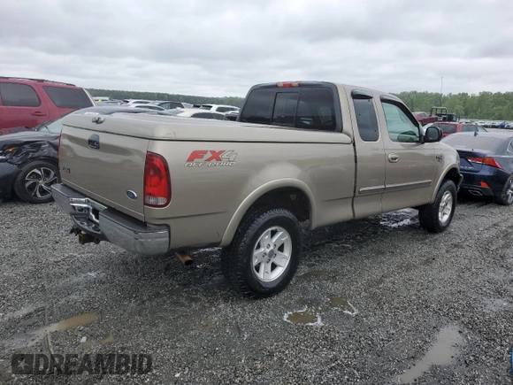 2002 Ford F-150 XL with VIN 1FTRX18L02NA58574, listed as a Copart auction lot 57156255 with 291,950 mi miles and Salvage title. Bid and sale history available at DreamBid. Image 3.