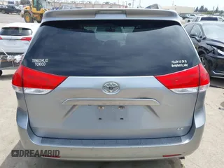 2012 Toyota Sienna LE AAS z VIN 5TDKK3DC5CS183731, wystawiony jako IAAI lot #42247364 z przebiegiem 148 723 mil mil oraz . Historia ofert i sprzedaży dostępna na DreamBid. Obrazek 16.