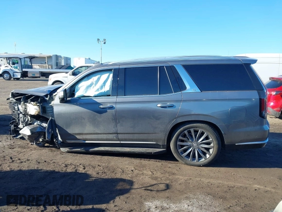 2021 Cadillac Escalade Premium Luxury z VIN 1GYS4CKL2MR231788, wystawiony jako IAAI lot #41630686 z przebiegiem 56 672 mil mil oraz . Historia ofert i sprzedaży dostępna na DreamBid. Obrazek 14.