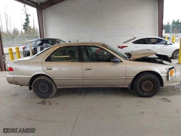 2001 Toyota Camry CE with VIN JT2BG22KX10605894, listed as a IAAI auction lot 41910238 with 203,338 mi miles. Bid and sale history available at carsss.com. Image 13.