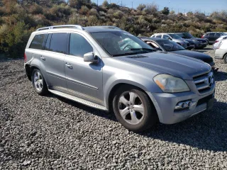 2011 Mercedes-Benz GL-Class GL 450 with VIN 4JGBF7BE5BA634180, listed as a Copart auction lot 69034074 with 219,553 mi miles and Salvage Title. Bid and sale history available at carsss.com. Image 4.