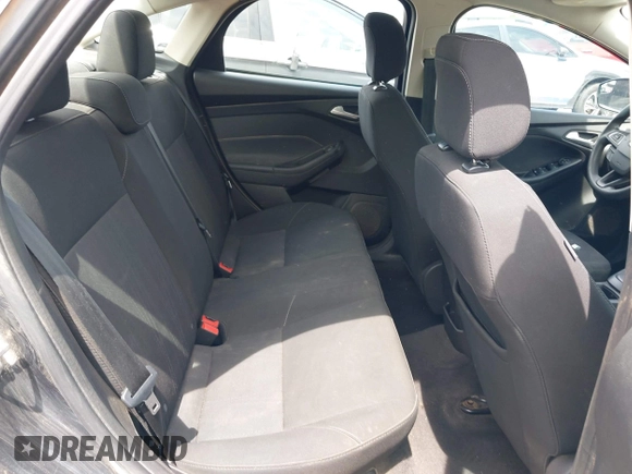 2018 Ford Focus SE with VIN 1FADP3F20JL312395, listed as a IAAI auction lot 42110335 with 110,720 mi miles and . Bid and sale history available at DreamBid. Image 8.