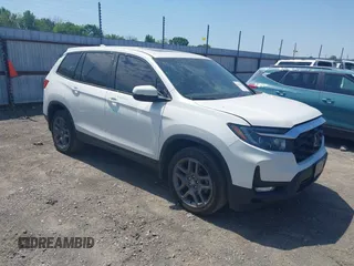2023 Honda Passport EX-L z VIN 5FNYF8H57PB006499, wystawiony jako IAAI lot #42036371 z przebiegiem 51 404 mil mil oraz . Historia ofert i sprzedaży dostępna na DreamBid. Obrazek 1.