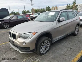 2015 BMW X1 xDrive28i with VIN WBAVL1C55FVY41749, listed as a IAAI auction lot 40977221 with 120,924 mi miles. Bid and sale history available at carsss.com. Image 18.