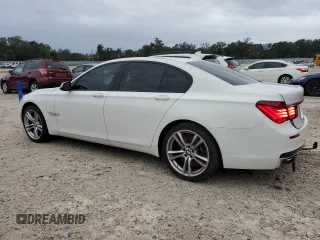 2013 BMW 7 Series 750i with VIN WBAYA8C54DC996569, listed as a Copart auction lot 74199774 with 107,871 mi miles and Salvage Title. Bid and sale history available at DreamBid. Image 2.