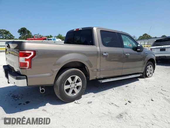 2018 Ford F-150 XL with VIN 1FTEW1CG4JKC38569, listed as a Copart auction lot 54779805 with 97,190 mi miles and Salvage Title. Bid and sale history available at carsss.com. Image 3.