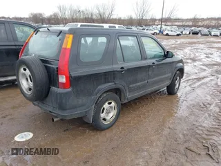2004 Honda CR-V LX with VIN SHSRD78484U202497, listed as a IAAI auction lot 41658740 with 244,446 mi miles and . Bid and sale history available at carsss.com. Image 4.