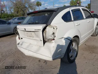 2009 Dodge Caliber SXT with VIN 1B3HB48A69D130857, listed as a IAAI auction lot 41526199 with 163,796 mi miles and . Bid and sale history available at DreamBid. Image 16.