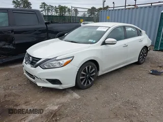 2018 Nissan Altima SR with VIN 1N4AL3AP7JC174856, listed as a IAAI auction lot 42070366 with 135,680 mi miles and . Bid and sale history available at carsss.com. Image 2.