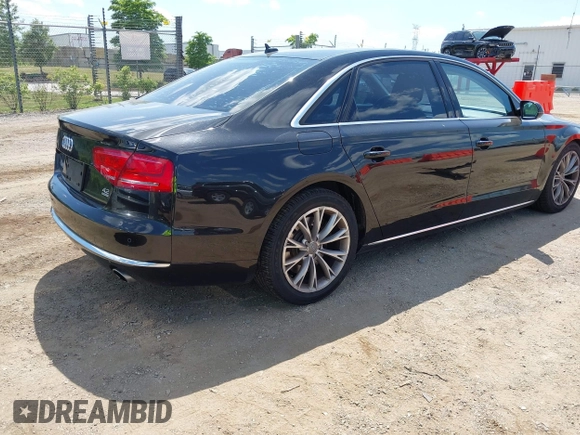 2011 Audi A8 with VIN WAURVAFD6BN005425, listed as a IAAI auction lot 42623409 with 264,365 mi miles and . Bid and sale history available at DreamBid. Image 4.