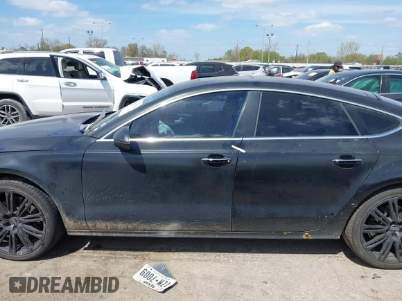 2015 Audi A7 3.0 TDI Premium Plus with VIN WAUWMAFC0FN029822, listed as a IAAI auction lot 41828754 with 148,847 mi miles. Bid and sale history available at carsss.com. Image 14.