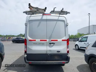 2017 Ford Transit z VIN 1FTYR1CM4HKA90749, wystawiony jako IAAI lot #42290302 z przebiegiem 185 603 mil mil oraz . Historia ofert i sprzedaży dostępna na DreamBid. Obrazek 16.