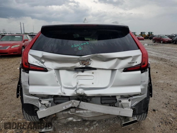 2021 Cadillac XT4 FWD Premium Luxury with VIN 1GYFZCR48MF083164, listed as a Copart auction lot 55377235 with 63,987 mi miles and Salvage title. Bid and sale history available at DreamBid. Image 6.