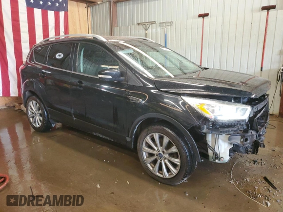 2018 Ford Escape Titanium with VIN 1FMCU9J9XJUA01357, listed as a Copart auction lot 56868735 with 67,315 mi miles and Salvage title. Bid and sale history available at DreamBid. Image 4.