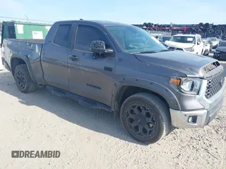2021 Toyota Tundra SR z VIN 5TFRY5F12MX287156, wystawiony jako IAAI lot #42125566 z przebiegiem 101 073 mil mil oraz . Historia ofert i sprzedaży dostępna na DreamBid. Obrazek 1.