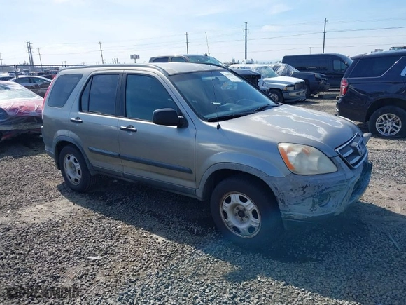 2006 Honda CR-V LX with VIN JHLRD68516C006561, listed as a IAAI auction lot 41855457 with 215,139 mi miles. Bid and sale history available at carsss.com. Image 1.
