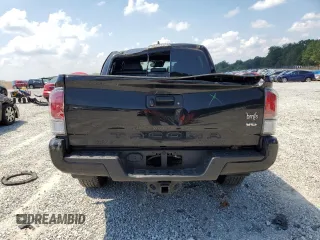 2023 Toyota Tacoma SR with VIN 3TMCZ5AN3PM571922, listed as a Copart auction lot 61872775 with 34,501 mi miles and Salvage title. Bid and sale history available at DreamBid. Image 6.
