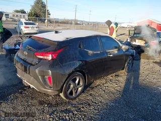 2019 Hyundai Veloster 2.0 with VIN KMHTG6AF6KU016662, listed as a IAAI auction lot 41354487 with 95,623 mi miles. Bid and sale history available at carsss.com. Image 4.