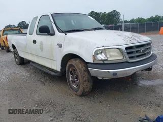 2001 Ford F-150 XL z VIN 1FTRX17L11NB54097, wystawiony jako IAAI lot #42353176 z przebiegiem 258 729 mil mil oraz . Historia ofert i sprzedaży dostępna na DreamBid. Obrazek 1.
