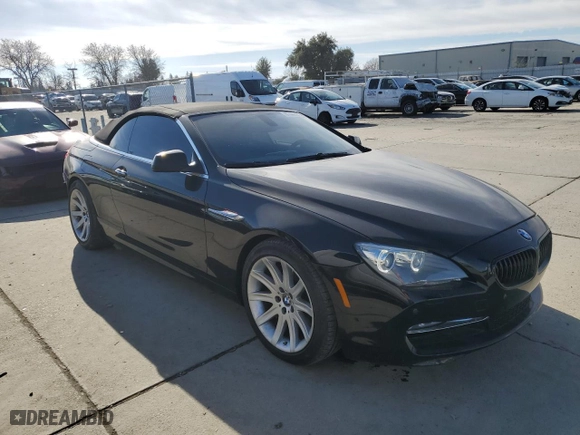 2012 BMW 6 Series 650i with VIN WBALZ3C51CDL72422, listed as a Copart auction lot 87447914 with 115,376 mi miles and Salvage Title. Bid and sale history available at carsss.com. Image 4.