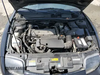 1998 Pontiac Sunfire z VIN 4G2JB32T1WB201350, wystawiony jako Copart lot #53074805 z przebiegiem 128 486 mil mil oraz Szkody całkowita. Historia ofert i sprzedaży dostępna na DreamBid. Obrazek 11.