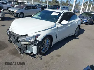 2019 Infiniti Q50 3.0t LUXE with VIN JN1EV7AP2KM543392, listed as a IAAI auction lot 41068209 with 55,897 mi miles. Bid and sale history available at carsss.com. Image 2.