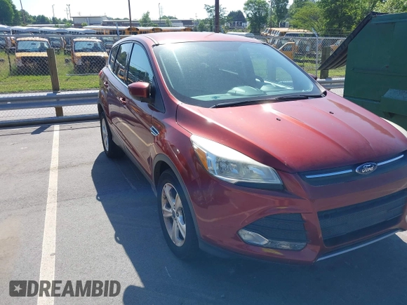 2015 Ford Escape SE with VIN 1FMCU0G72FUC31709, listed as a IAAI auction lot 42135657 with 157,952 mi miles. Bid and sale history available at carsss.com. Image 6.