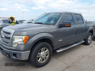 2013 Ford F-150 XL with VIN 1FTFW1CTXDFA78857, listed as a IAAI auction lot 42416880 with 215,031 mi miles and . Bid and sale history available at DreamBid. Image 2.
