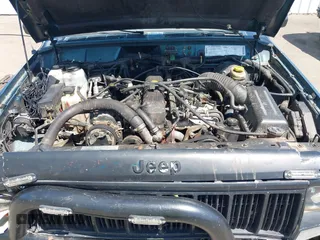 1995 Jeep Cherokee Sport with VIN 1J4FJ68S7SL631078, listed as a IAAI auction lot 42408148 with 190,765 mi miles and . Bid and sale history available at DreamBid. Image 10.