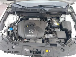 2018 Mazda CX-5 Touring with VIN JM3KFACM1J1431462, listed as a IAAI auction lot 41038099 with 77,489 mi miles. Bid and sale history available at carsss.com. Image 10.