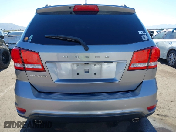 2019 Dodge Journey SE with VIN 3C4PDCBG0KT701223, listed as a IAAI auction lot 41286446 with 71,572 mi miles and . Bid and sale history available at DreamBid. Image 16.