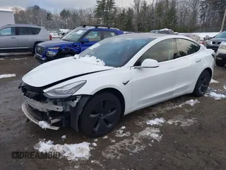 2020 Tesla Model 3 Long Range with VIN 5YJ3E1EB6LF784169, listed as a IAAI auction lot 40957226 with 96,415 mi miles. Bid and sale history available at carsss.com. Image 2.
