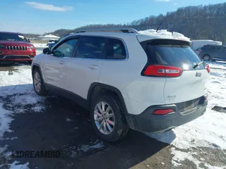 2015 Jeep Cherokee Limited with VIN 1C4PJMDS9FW718151, listed as a IAAI auction lot 41344018 with 124,185 mi miles and . Bid and sale history available at DreamBid. Image 3.