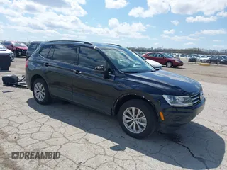 2019 Volkswagen Tiguan S z VIN 3VV0B7AX3KM119645, wystawiony jako IAAI lot #41973924 z przebiegiem 100 914 mil mil oraz . Historia ofert i sprzedaży dostępna na DreamBid. Obrazek 1.