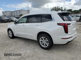 2024 Cadillac XT6 FWD Luxury with VIN 1GYKPAR4XRZ746989, listed as a Copart auction lot 77325614 with 2,234 mi miles and Salvage Title. Bid and sale history available at carsss.com. Image 2.