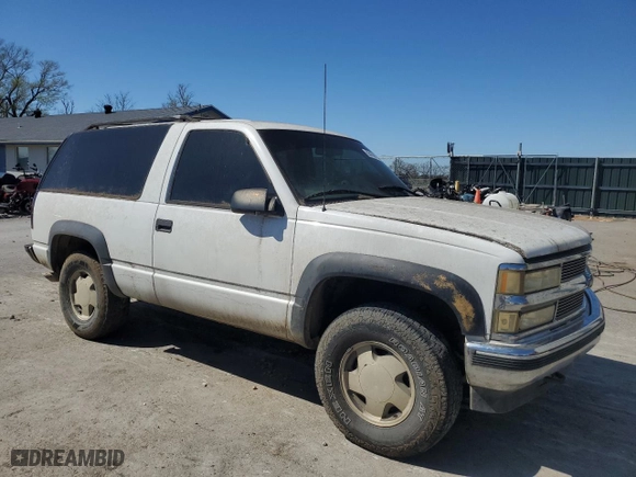 1999 Chevrolet Tahoe with VIN 3GNEK18R4XG171744, listed as a Copart auction lot 50160915 with 209,175 mi miles and Salvage Title. Bid and sale history available at carsss.com. Image 4.