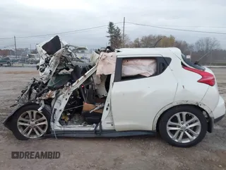 2012 Nissan Juke SL z VIN JN8AF5MV2CT124008, wystawiony jako IAAI lot #40751046 z przebiegiem Nie podano mil oraz . Historia ofert i sprzedaży dostępna na DreamBid. Obrazek 13.