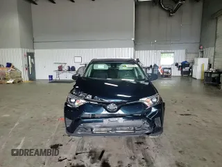 2017 Toyota RAV4 LE with VIN JTMBFREV6HJ165878, listed as a Copart auction lot 58940845 with 120,897 mi miles and Salvage title. Bid and sale history available at DreamBid. Image 14.