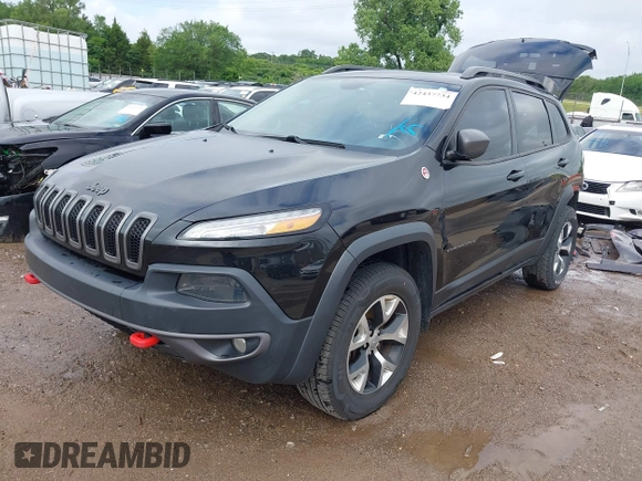 2015 Jeep Cherokee Trailhawk with VIN 1C4PJMBS5FW647601, listed as a IAAI auction lot 42437734 with 170,640 mi miles and . Bid and sale history available at DreamBid. Image 19.