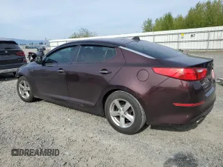 2015 Kia Optima LX with VIN 5XXGM4A72FG352039, listed as a Copart auction lot 54648345 with 126,898 mi miles and Salvage Title. Bid and sale history available at carsss.com. Image 2.