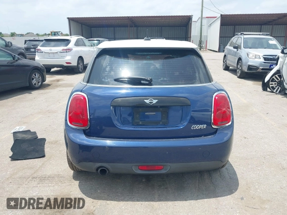 2017 MINI Hardtop 4 Door Cooper with VIN WMWXU1C59H2E18069, listed as a IAAI auction lot 42286035 with 85,835 mi miles and . Bid and sale history available at DreamBid. Image 16.
